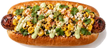 Mexico City dog — Charred corn · cotija · jalapeño crema · cilantro · chile-lime